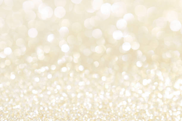 istock abstract background gold light bokeh christmas holiday 1042433414