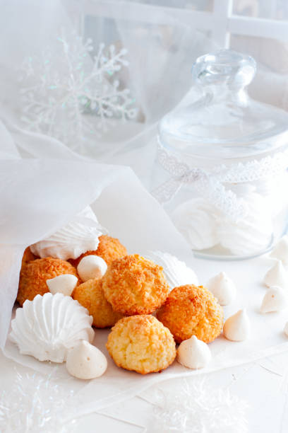 istock Coconut cookies macarons with copra on a white background closeup 1042434748