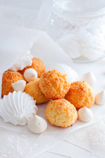 istock Coconut cookies macarons with copra on a white background closeup 1042434990