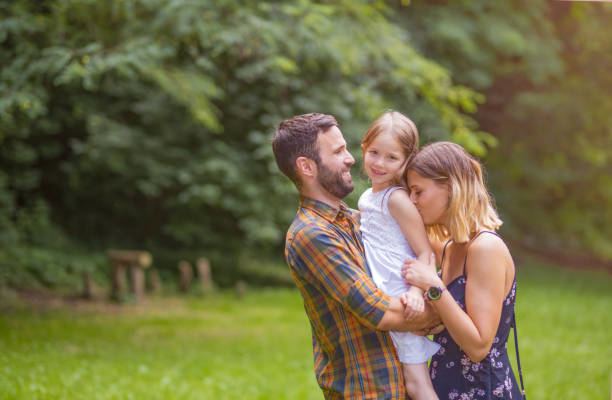 istock Happy young family in the forest. 1042437390