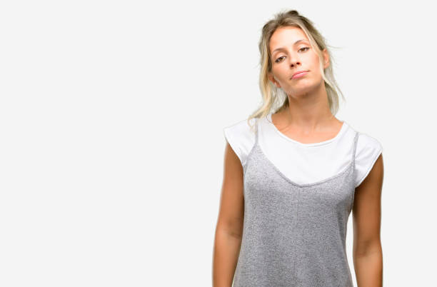istock Young beautiful woman with sleepy expression, being overworked and tired 1042437524