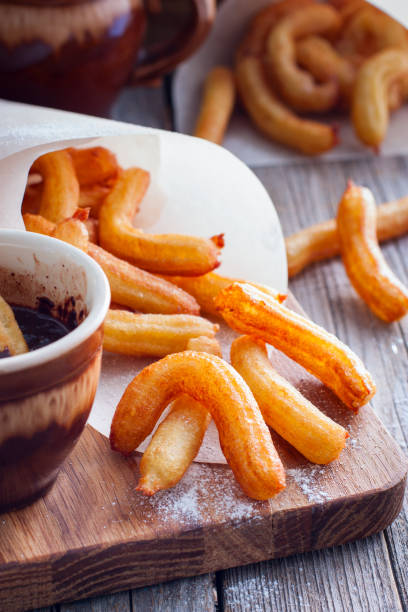 istock Churros - Spanish dessert from a custard batter, selective focus 1042437618