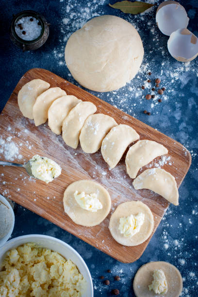 istock ingredients and process for making dumplings with curd, top view, selective focus 1042441174