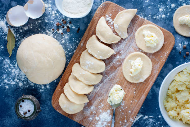 istock ingredients and process for making dumplings with curd, top view, selective focus 1042441230