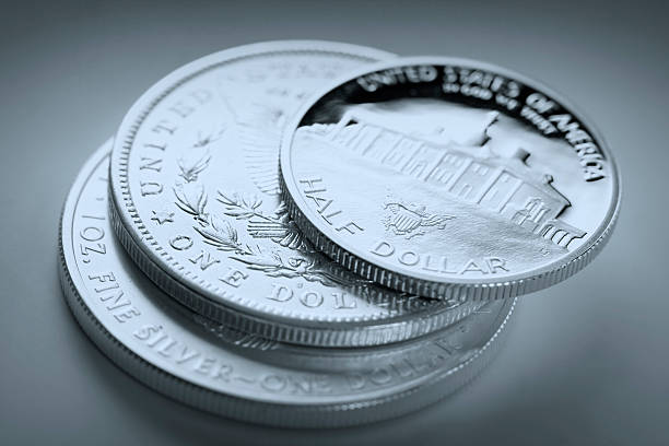 istock dollar coins on financial newspaper 104244264