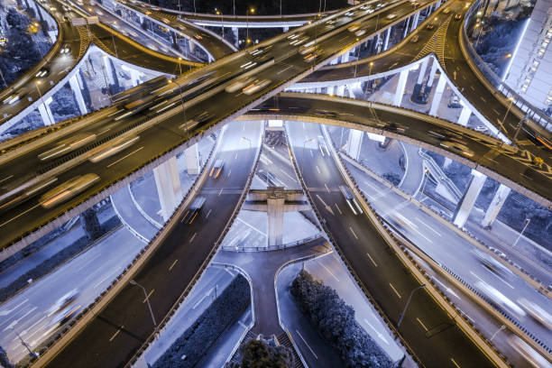 istock aerial view of highway interchange at night 1042446920