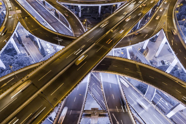 istock aerial view of highway interchange at night 1042446942