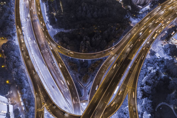istock aerial view of highway interchange at night 1042446982