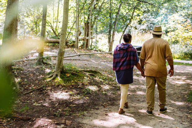 istock Smiling seniors couple on the walk 1042447052