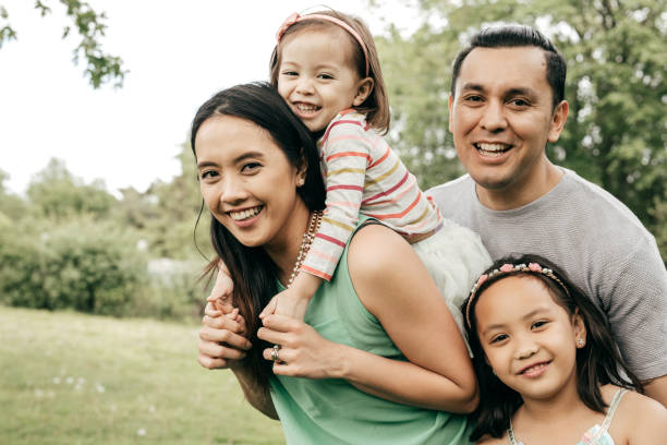 istock Happy family having fun outdoor 1042447330