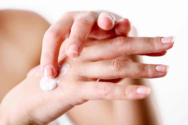 istock Young woman cares about her hands 104244754