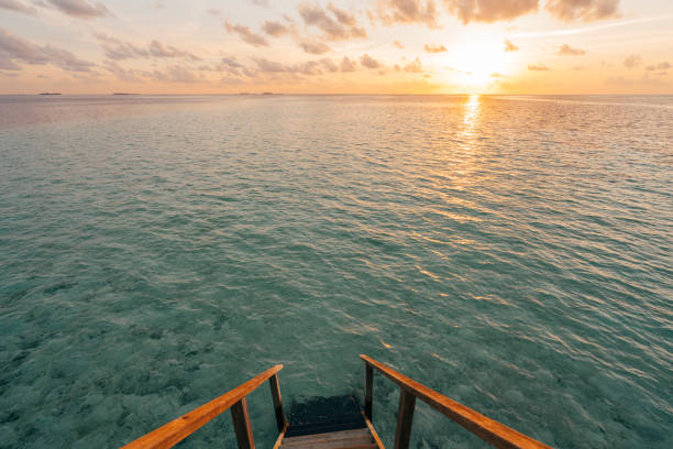 istock Chasing the sun in Maldives 1042451068