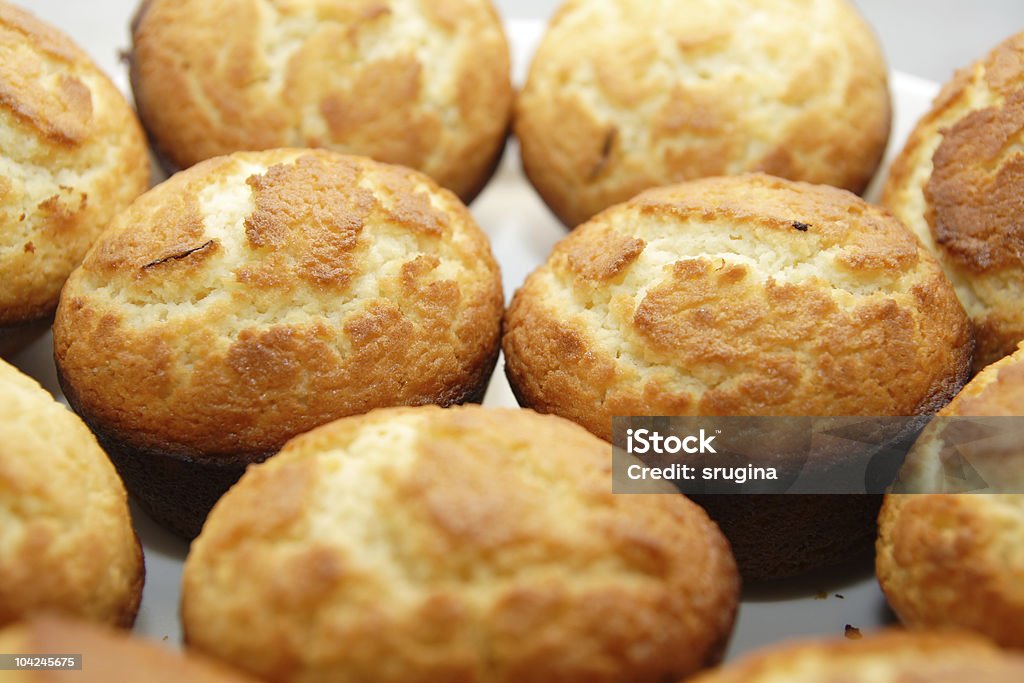 Freshly baked batch of muffins  Baked Stock Photo