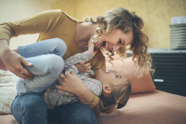 this moments make me happy. unconditional love. mother daughter time. - tickling imagens e fotografias de stock