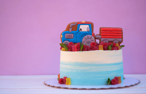 istock beautiful birthday cake with tractor 1042461258