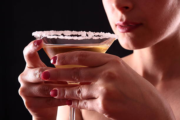 Woman and martini glass stock photo