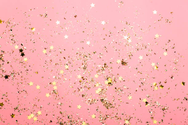 istock Pink festive confetti background. Bright background for celebration birthday. 1042462212