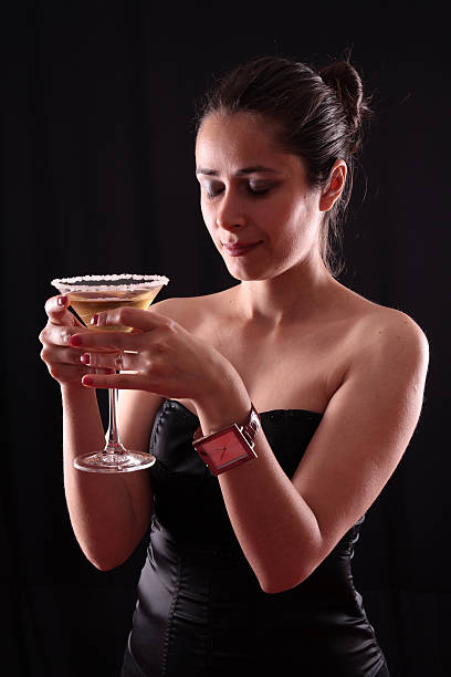 Woman and martini glass stock photo