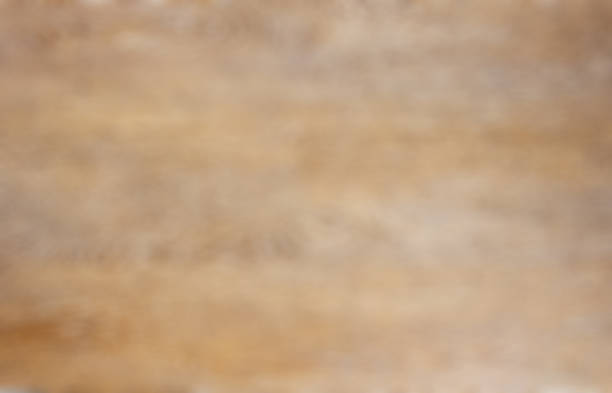 istock Brown wooden blurred background 1042470230