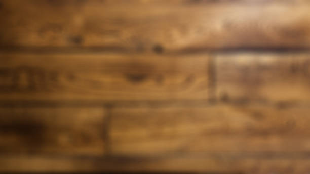 istock Brown wooden blurred background 1042470236