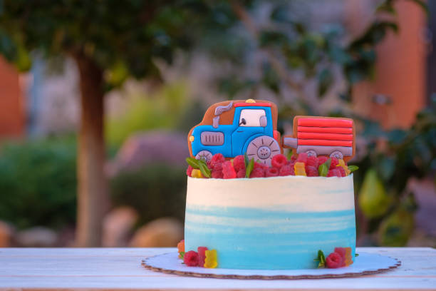 istock beautiful birthday cake with tractor 1042471712