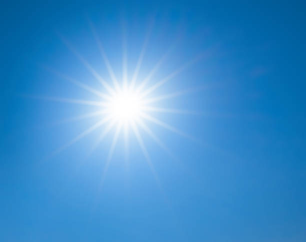 istock sun is in a star shape on blue sky 1042471776