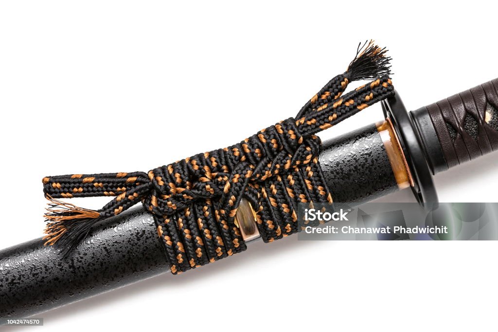 Sageo cord for tie the scabbard of Japanese sword isolated in white background. Antique Stock Photo