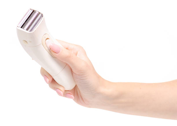 istock Female electric shaver in a hand 1042477396