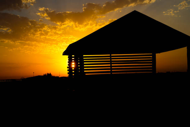 View from alcove on orange sunset sky. Seaside tropics. Selective focus. Beach side concept