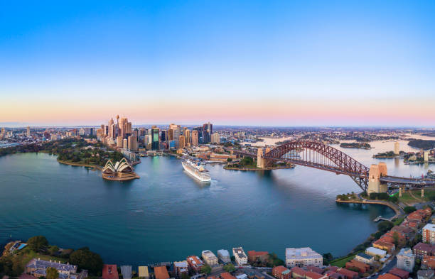 Panoramic View of Beautiful Sunrise at Sydney City Skyline Aerial Panoramic View of Beautiful Sunrise at Sydney City Skyline passenger craft stock pictures, royalty-free photos & images