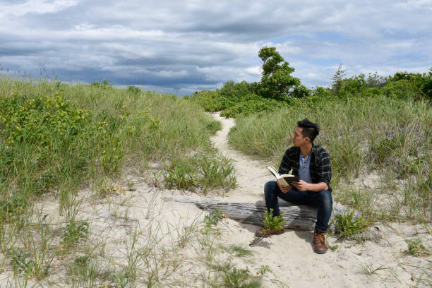istock young man, outdoors, casual fashion 1042489638