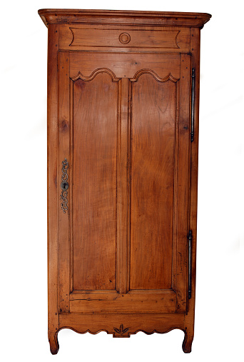Vintage of old solid wooden folding doors texture. Antique folding doors at old wooden house. The unique Javanese doors and frame which is generally made of teak wood. Doors are close.