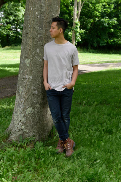 istock young man, outdoors, casual fashion 1042492128