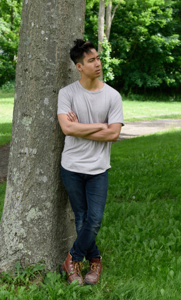 istock young man, outdoors, casual fashion 1042492288