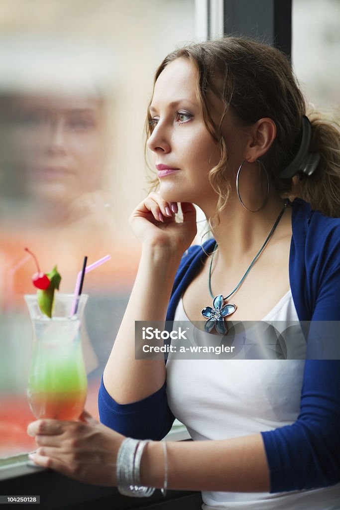 Young woman with a cocktail  Adult Stock Photo