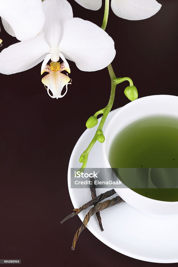 Xícara de Chá Verde com Orquídea branca, - Royalty-free Bebida Foto de stock