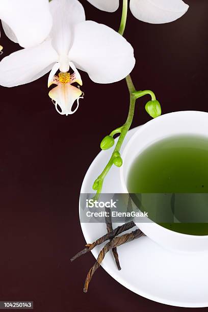 Xícara De Chá Verde Com Orquídea Branca - Fotografias de stock e mais imagens de Bebida - Bebida, Branco, Bule de Chá