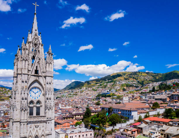 Ecuador, city view of Quito from gothic Basilica del Voto Nacional Ecuador, city view of Quito from gothic Basilica del Voto Nacional clock tower quito photos stock pictures, royalty-free photos & images