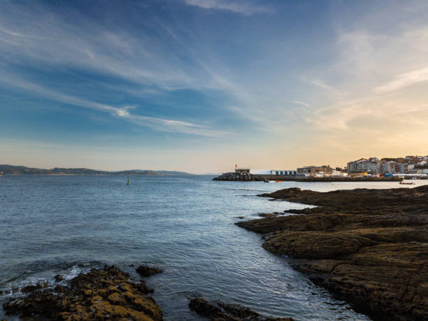 istock Cliffs and small lighthouse in Pontevedra, Spain 1042508934