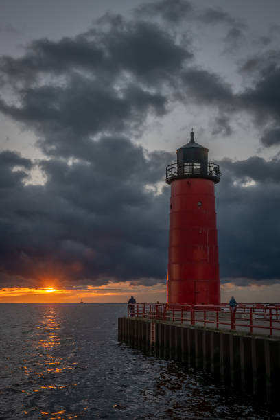 istock Red Pierhead Light House on Lake Michigan 1042509268