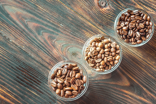 Bowls of different types of coffee beans