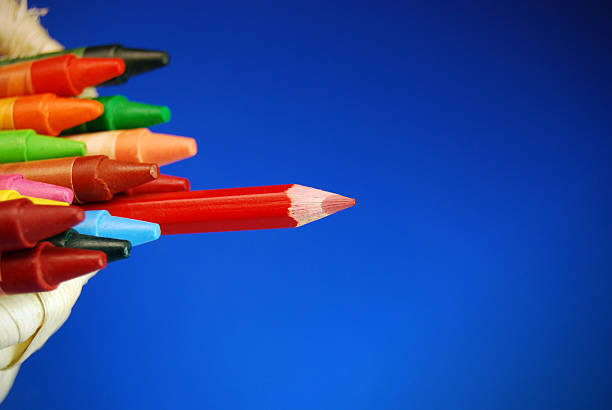 istock Color Pencils - Standing out of crowd 104251628