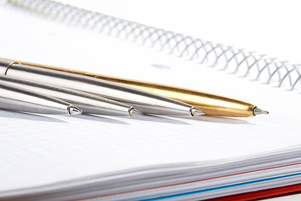 istock line of ball-point pens lays 104252369