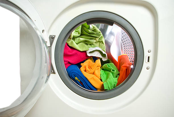 istock Close-up view of a washer filled with clothes 104252385