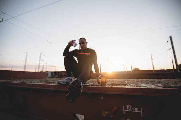 istock Athlete relaxing after a workout on a train cart 1042523890