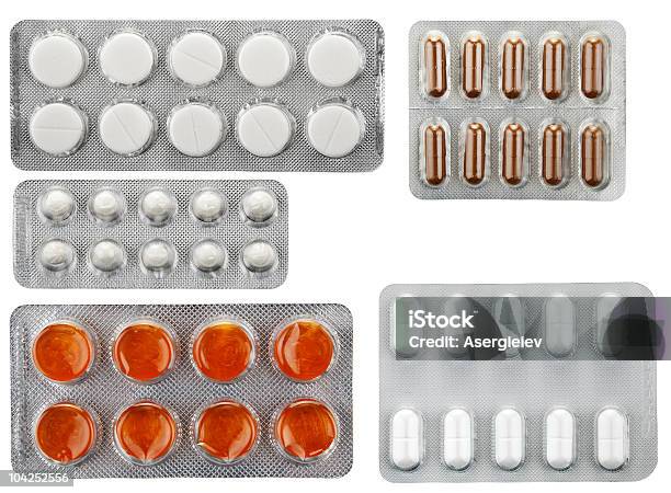 Pillole Di Imballaggio - Fotografie stock e altre immagini di Affollato - Affollato, Bianco, Capsula