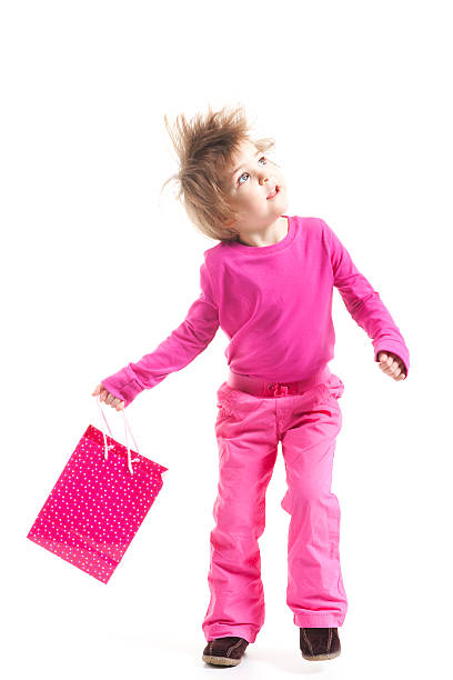 Little shopper in pink stock photo