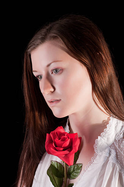 Redhead girl with rose stock photo