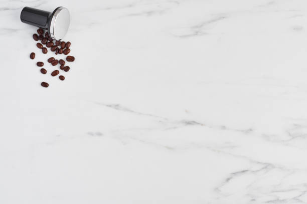 Coffee concept: coffee tamper and roasted coffee beans