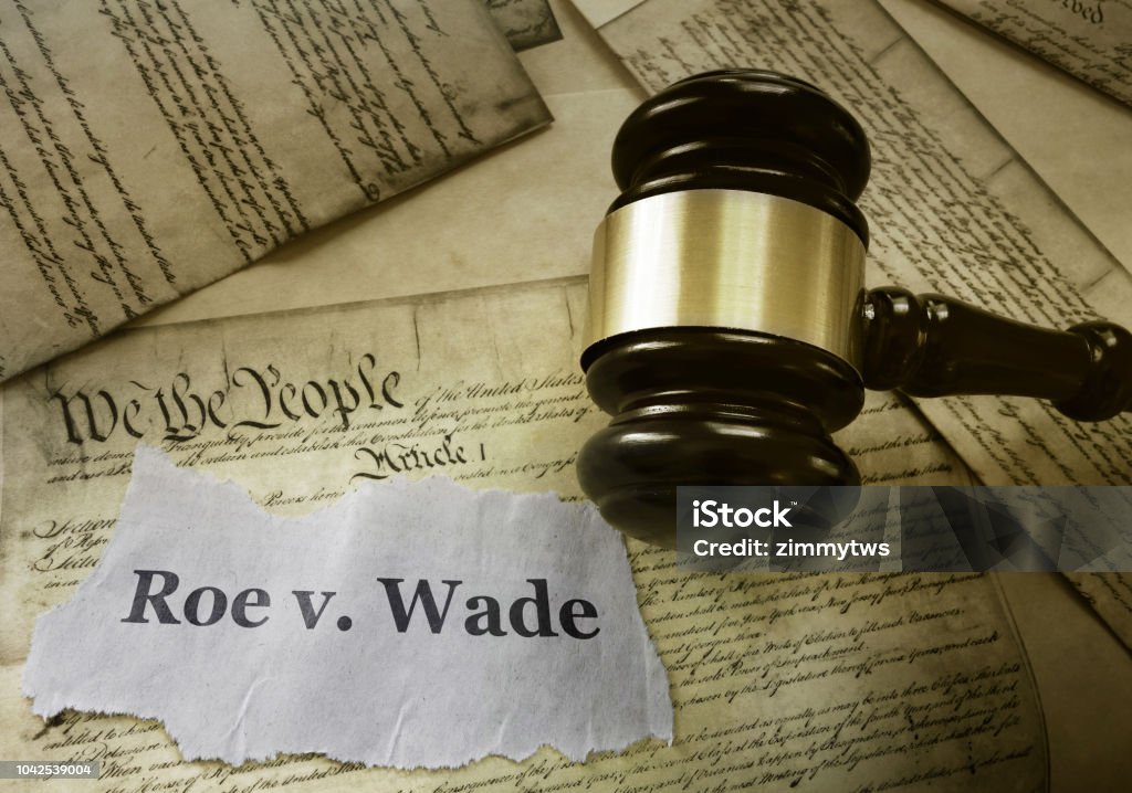 Roe v Wade constitution Roe v Wade news headline with gavel on a copy of the United States Constitution Roe v. Wade Stock Photo